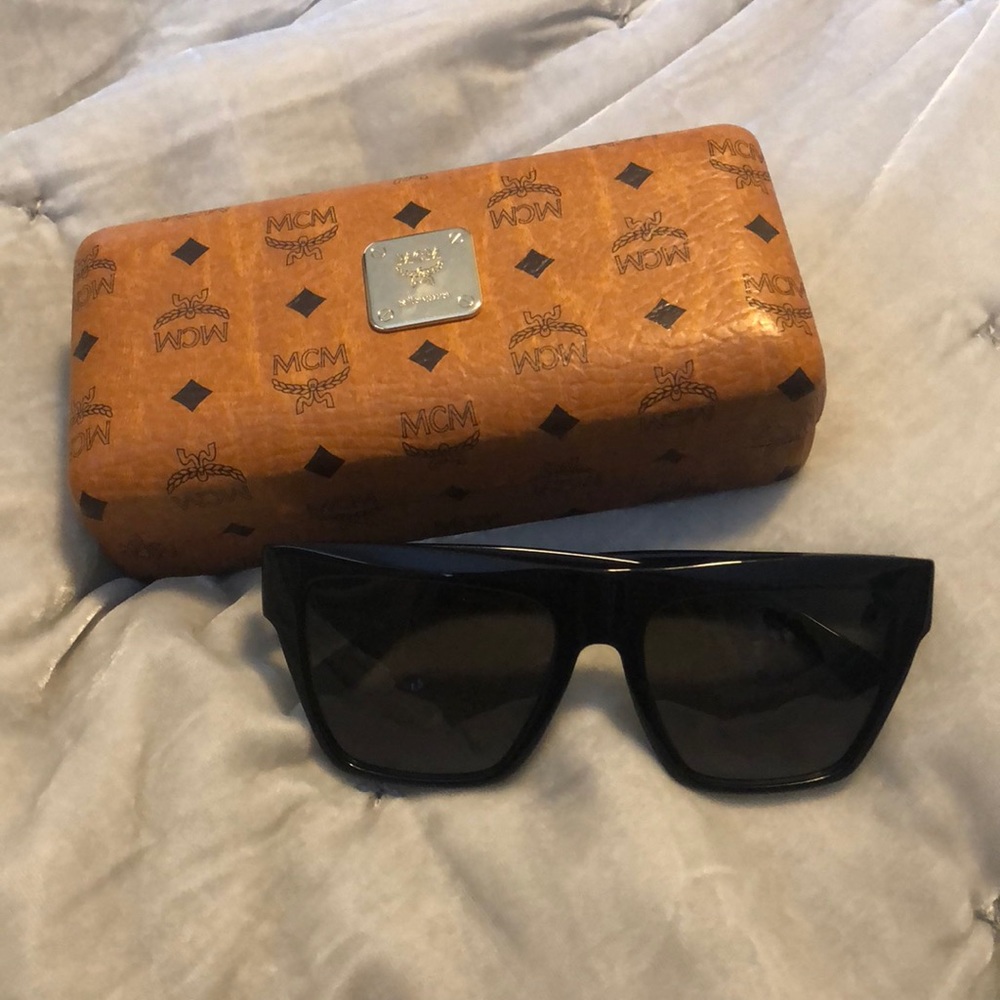 MCM black sunglasses with gold studded accents